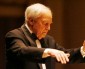 Do Musician and Conductors Hear Music Differently?